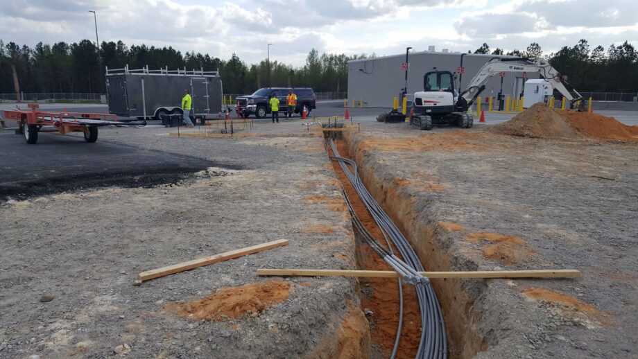 Construction trench with underground electrical conduit